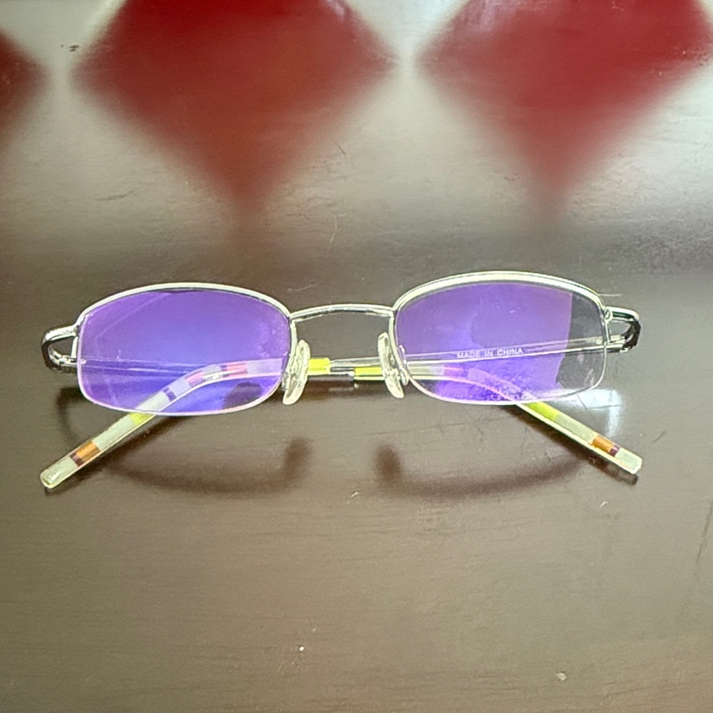 Authentic Early 2000’s Purple Tinted sunglasses